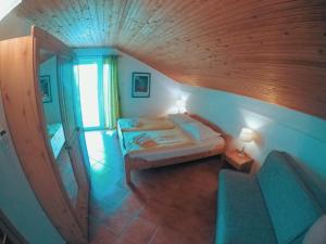 Кровать или кровати в номере Apartements Magdalena