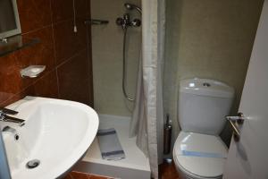 Koupelna v ubytování Hotel Olympos