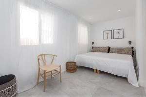 Łóżko lub łóżka w pokoju w obiekcie Bella Vista Puerto Banus apartment with sea views