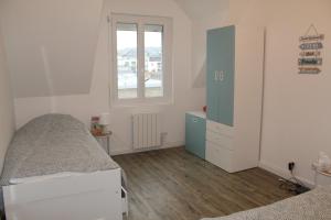 Ліжко або ліжка в номері Appartement Quiberon