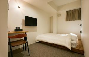 Televisyen dan/atau pusat hiburan di mizuka Daimyo 7 - unmanned hotel -