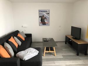 TV a/nebo společenská místnost v ubytování Chalet Wanda