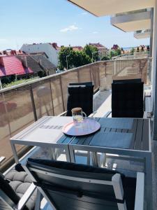 Balkón alebo terasa v ubytovaní DOBRY MOMENT - apartament Giżycko