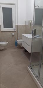 Koupelna v ubytování Albergo Athena Mare