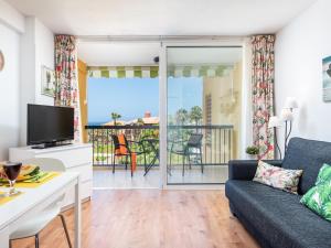 TV a/nebo společenská místnost v ubytování 32 BRIGHT COPACABANA ocean view free WiFi