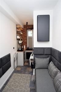 Kuchyňa alebo kuchynka v ubytovaní Mikro Apartament Solo na Starówce 8m2