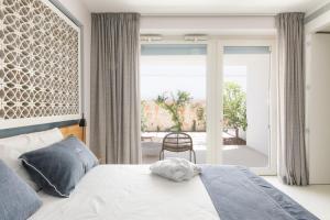 Een bed of bedden in een kamer bij Santa Caterina - Dimora sul mare