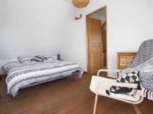Postel nebo postele na pokoji v ubytování Ty Kergui