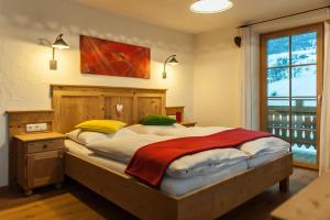 Postel nebo postele na pokoji v ubytování Residence Mitterdorfer
