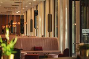 Posezení v ubytování Holiday Inn - the niu, Loco Munich North by IHG
