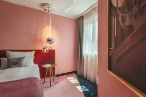 Postel nebo postele na pokoji v ubytování Holiday Inn - the niu, Loco Munich North by IHG