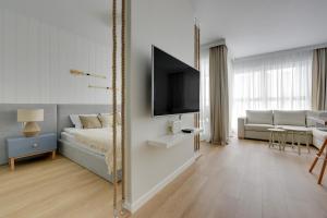 Postel nebo postele na pokoji v ubytování Comfort Apartments Granaria
