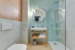Koupelna v ubytování Comfort Apartments Granaria