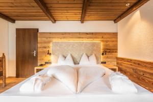 Ein Bett oder Betten in einem Zimmer der Unterkunft Alpenlove - Adult SPA Hotel