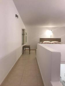 Ένα ή περισσότερα κρεβάτια σε δωμάτιο στο Dimitris apartments