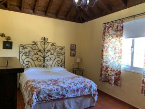 En eller flere senger på et rom på Villas Las Cercas