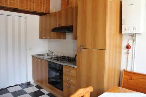 Kuchyň nebo kuchyňský kout v ubytování Casa Robion