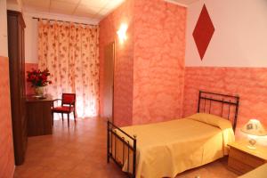 Postel nebo postele na pokoji v ubytování B&B Rinascente