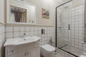 Ванна кімната в Apartments MaisoNº11