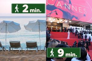 a group of people walking down a red carpet at Grand Studio Cannes Centre in Cannes