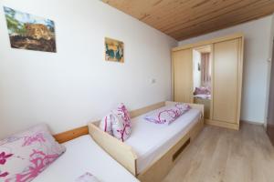Posteľ alebo postele v izbe v ubytovaní Haus Bucher