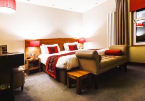 Un pat sau paturi într-o cameră la Orocco Pier