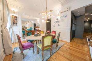 a dining room with a table and chairs at Bliss Lisbon Apartments - Avenidas in Lisbon