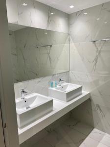 Kúpeľňa v ubytovaní AGRELLI Hotel & Suites