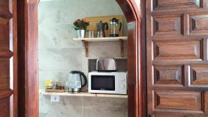 Kuchnia lub aneks kuchenny w obiekcie Madre Tierra Apartment