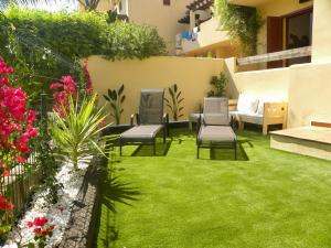 Vonkajšia záhrada v ubytovaní Bahia Marinas - Tu hogar con jardín privado!
