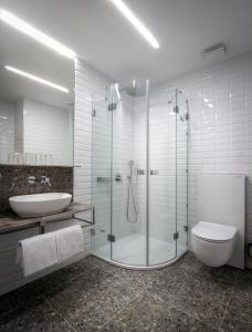 Kylpyhuone majoituspaikassa Hotel Mucha