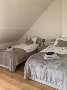 Ένα ή περισσότερα κρεβάτια σε δωμάτιο στο familieverblijf De groene Specht