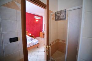 Postel nebo postele na pokoji v ubytování Maxpensione