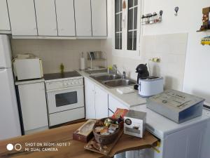 A kitchen or kitchenette at Nesaea Studio