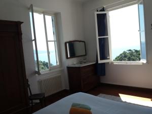 Llit o llits en una habitació de Trekking in paradise B&B
