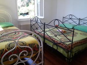 Llit o llits en una habitació de Trekking in paradise B&B