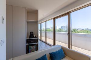 Кровать или кровати в номере Sea Porto Hotel