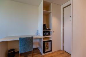 Кухня или мини-кухня в Sea Porto Hotel
