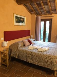 Postel nebo postele na pokoji v ubytování Dolce Vita in Tuscany B&B