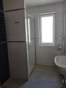 Kúpeľňa v ubytovaní Apartament Czarna Góra S6