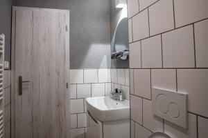 Koupelna v ubytování K-house + 21 fotografií