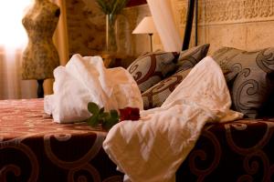 Posteľ alebo postele v izbe v ubytovaní Hotel Casa Babel