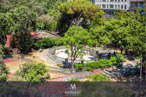 A garden outside MONART HOSPITALITY Cavour