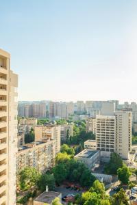 an aerial view of a city with tall buildings at Квартиры по улице Феодосийская, 1-А in Kyiv