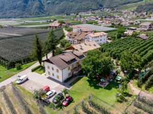 an aerial view of a house in a vineyard at St. Vigilhof in Nalles