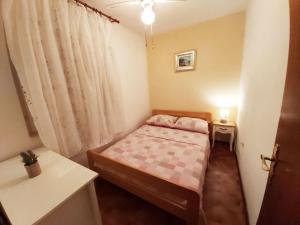 Postel nebo postele na pokoji v ubytování Apartments Carmen Vinisce