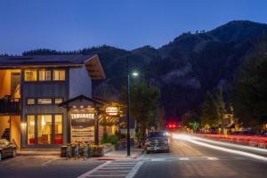 a truck parked in front of a building on a street at Tamarack Lodge in Ketchum