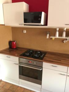Kuchyň nebo kuchyňský kout v ubytování Apartman Kryštof
