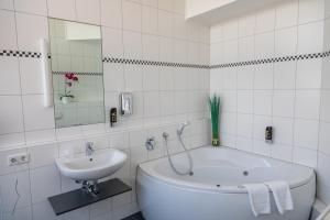 Koupelna v ubytování AUSZEIT DAS HOTEL Schweitenkirchen