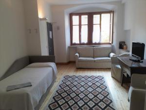 Postel nebo postele na pokoji v ubytování Albergo Accademia